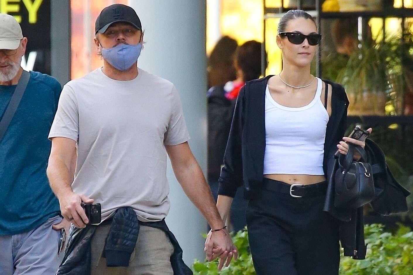 Leonardo DiCaprio, Vittoria Ceretti, and Leo’s mother Irmelin on a Roman balcony, August 2024