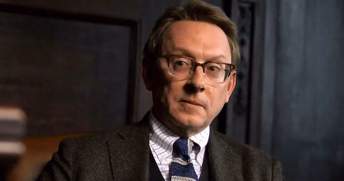 Silhouetted gavel falling with Michael Emerson’s profile in shadow