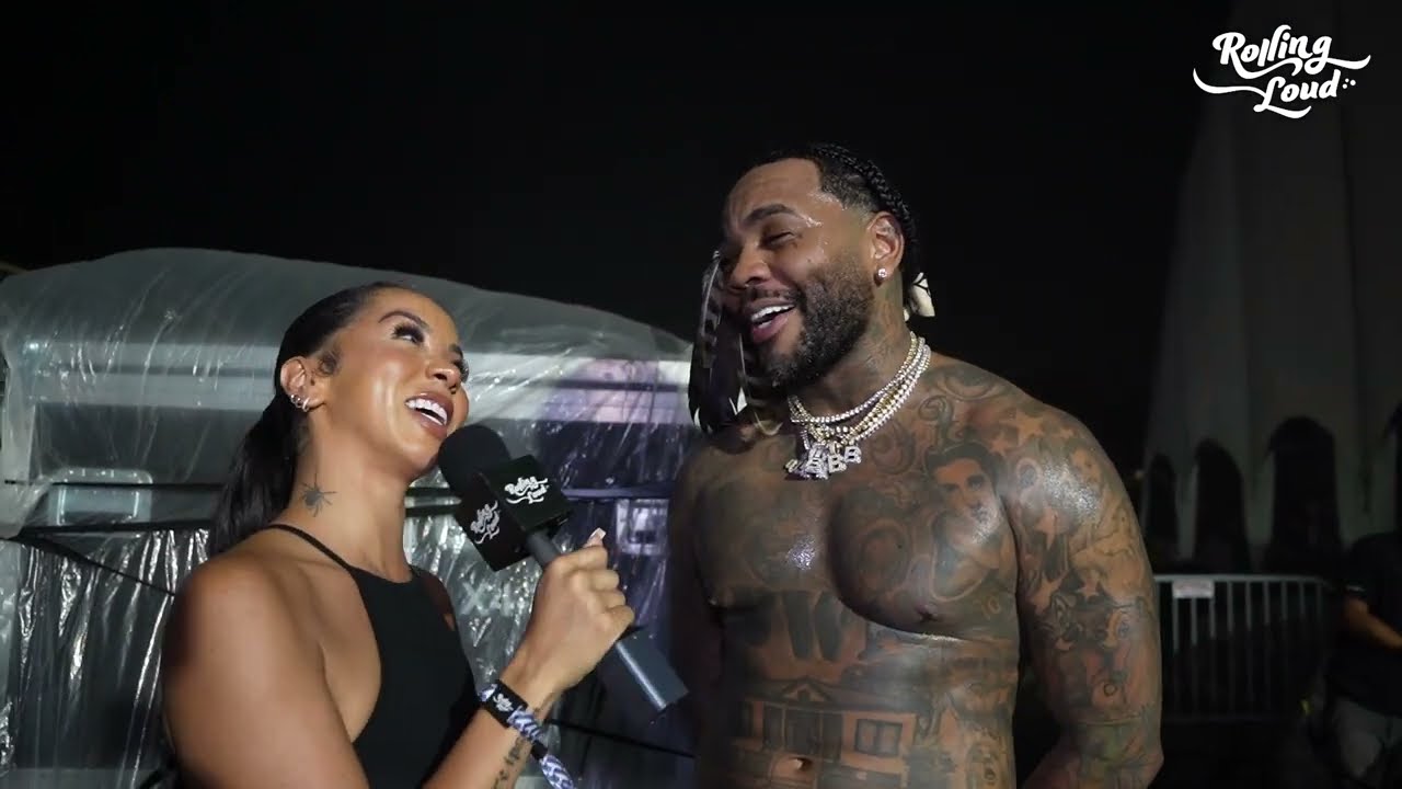 Brittany Renner and Kevin Gates laughing over dinner, shot in grainy black-and-white